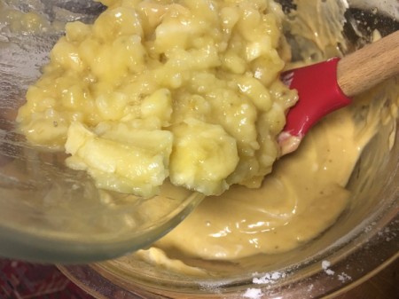 adding banana to batter