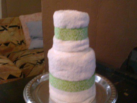 Bridal Shower Centerpiece or Gift - stack towels and slip bottle down in the center