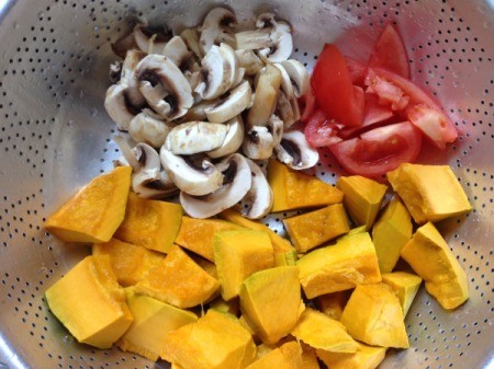 cut squash, mushrooms and tomatoes