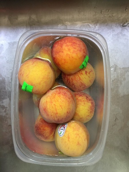 washing peaches