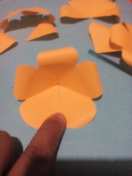 Layered Paper Flowers - pull together the two open ends of each flower