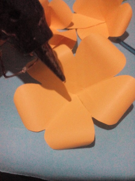 Layered Paper Flowers - add glue to the center of the flower