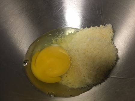egg and Parmesan in bowl