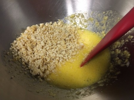 ground chicken, egg and parmesan in bowl