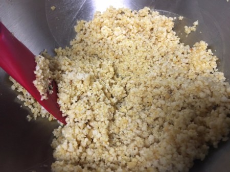 ground chicken, egg and parmesan in bowl mixed
