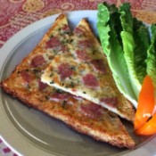 Flourless Chicken Pizza Crust pieces on plate