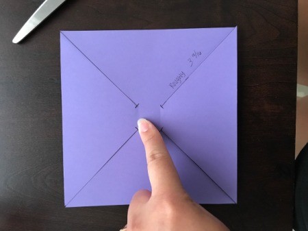 Handmade Pinwheel Mobile - find center and poke a hole with a thumbtack