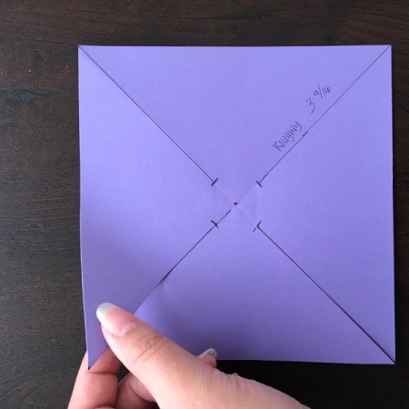 Handmade Pinwheel Mobile - gather one of the angle cuts into the center