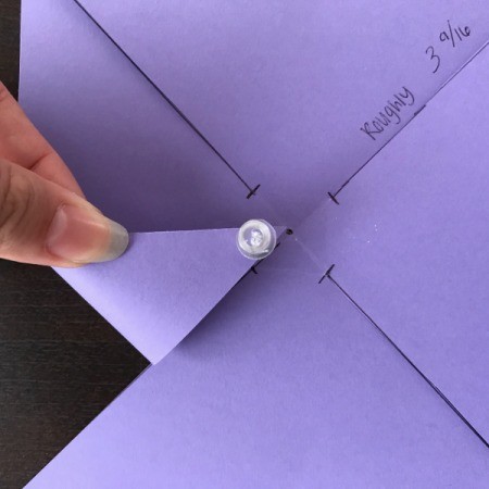 Handmade Pinwheel Mobile - poke a hole with the thumbtack