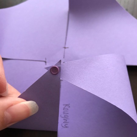 Handmade Pinwheel Mobile - continue around add each tip to the brad