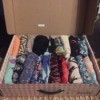 Store Leggings in a Shoe Box - rolled leggings stored in a large shoe box
