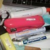 A variety of office supplies marked with a name.