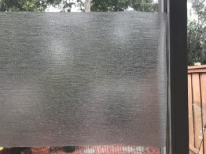 A window covered with a privacy window film.