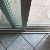 Secure Your Sliding Door and Windows - length of wood inside the sliding door track