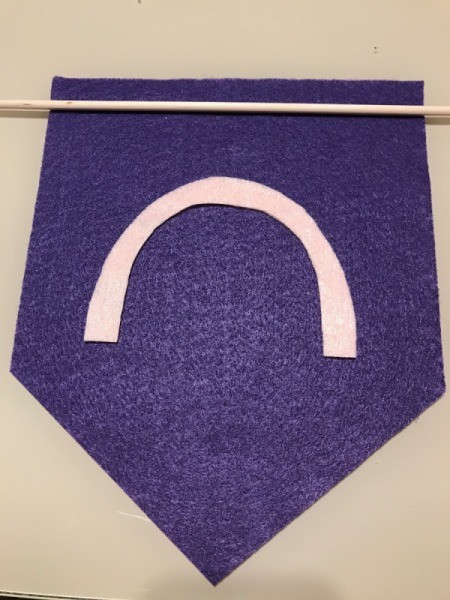 Pennant Flag Wall Decor - pink "u" shaped piece of felt on pennant