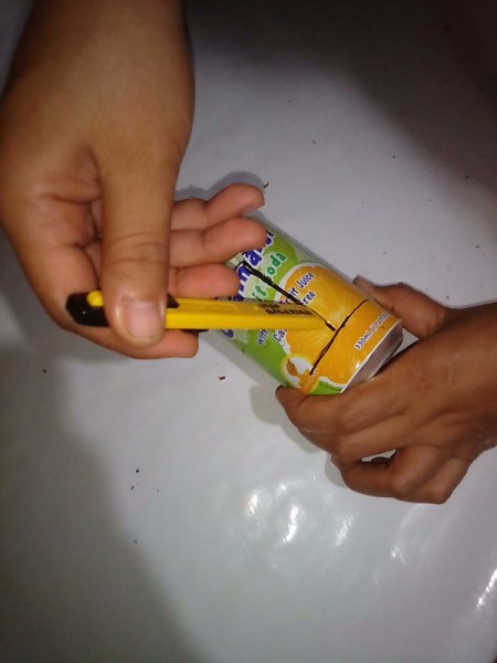 Recycled Can Candle Holder -cut along the pen lines