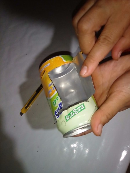 Recycled Can Candle Holder - fold aluminum out on cut lines