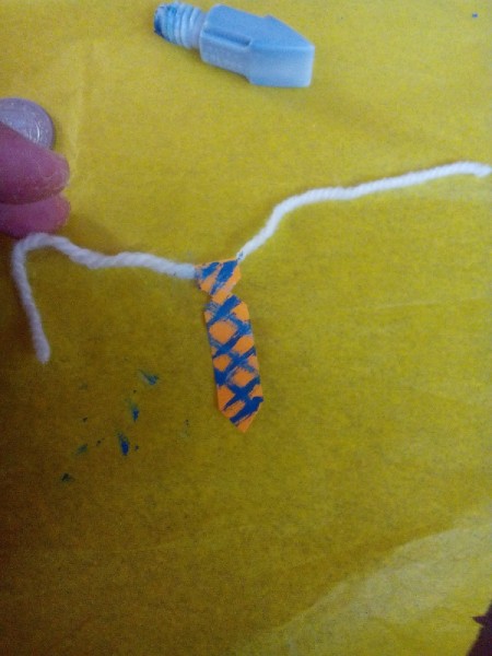 Father's Day Rock Art - add a pattern to the tie and snip the top area for the knot