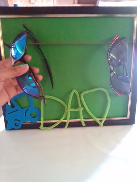 Frame of Shades for Father's Day - begin hanging glasses over the shoelace