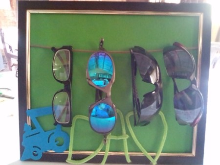 Frame of Shades for Father's Day - four pairs of glasses hanging