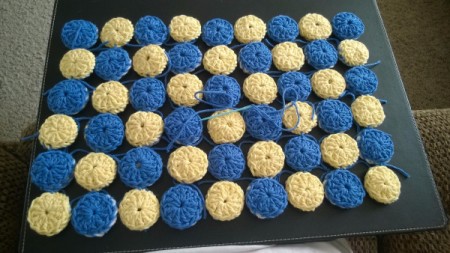 Crocheted Yo Yo Place Mat - finished checkerboard pattern from right side with rows tied together