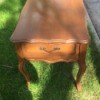 Value of Mersman Side Table - sitting in grass