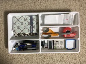 Organize Desk Drawer with Flatware Tray - desk items organized in tray