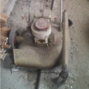 Information on Swivel Boy Lawn Mower - vintage 3 wheel mower
