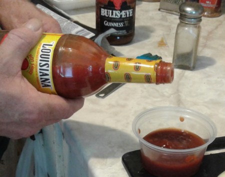pouring BBQ sauce