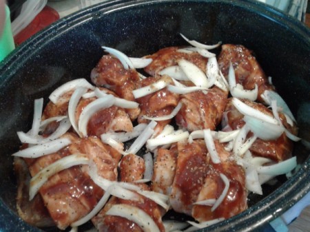 onions on top of Bacon Wrapped Chicken