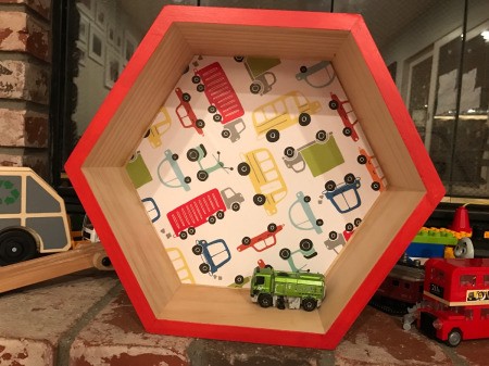 Honeycomb Hexagon Personalized Shelf - truck motif shelf with a toy inside