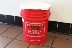 A 5 gallon bucket from Firehouse Subs, for use in gifting.