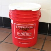 A 5 gallon bucket from Firehouse Subs, for use in gifting.