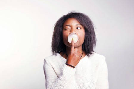 Girl Blowing Gum Bubble