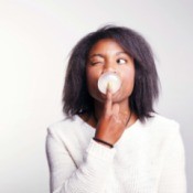 Girl Blowing Gum Bubble