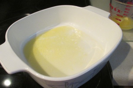 melted butter in baking dish