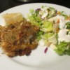 Creamy Caesar Herb Crusted Haddock on plate with salad