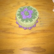 Crochet Koaster Keeper - closed box with crochet flower