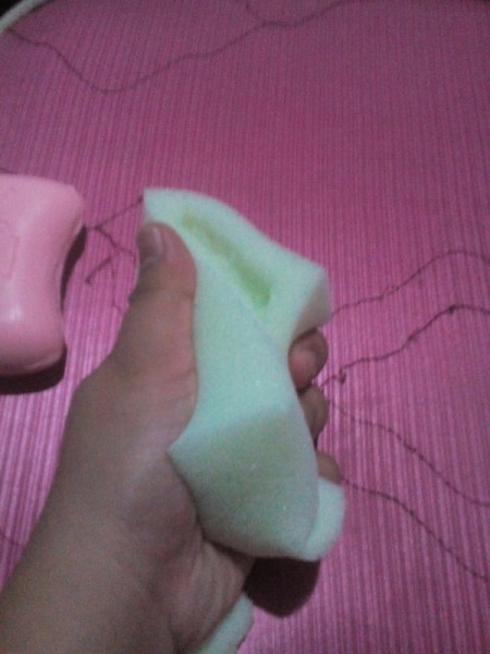 Use Foam to Line Soap Dish - example of squeezing foam for using up all of the melted soap and scraps