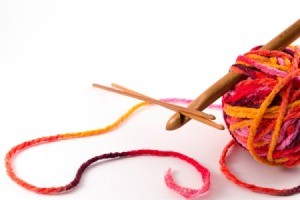 Crochet hooks and a ball of yarn.