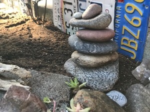 Stacked Rocks in the Garden - stack of rocks in a garden