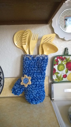 Crocheted Decorative Oven Mitt - mitt filled with cooking tools as a gift
