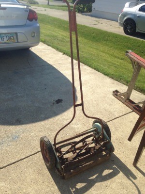 Value and Age of a Jacobsen Manual Reel Mower - mower in driveway