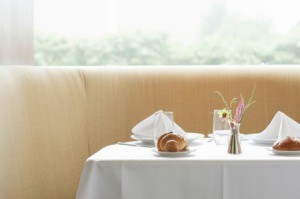 White tablecloth on a table.