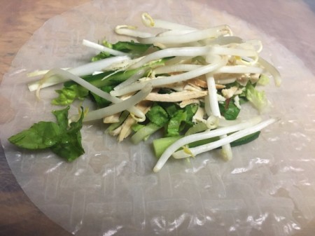 adding vegetables to wrapper