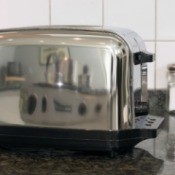 A clean stainless steel toaster.