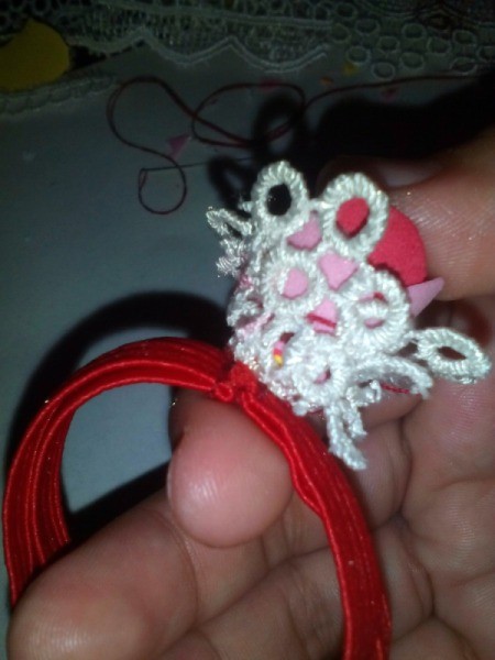 Ponytail Holder Made of Scrap Materials - attach the flower to the band