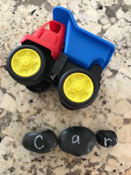 Alphabet Rocks - rocks spelling out "car"