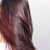 A brunette with red highlights.
