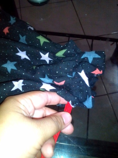 Pouch Made of Old Mini Dress - pull the elastic slightly tight and sew ends together